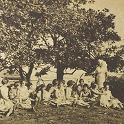 The matron and medical superintendent, extreme right, supervise some of the children in the grounds of the Sunshine Home, Gore Hill, North Sydney